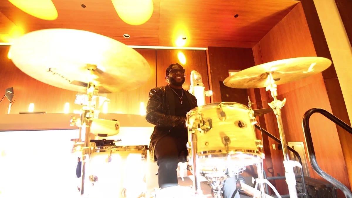 Drummer playing with the DJ