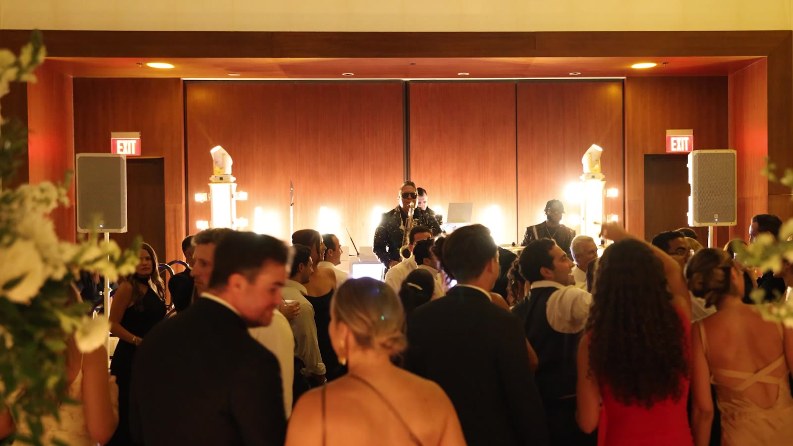 DJ Dayve with live saxophone and drums at a reception